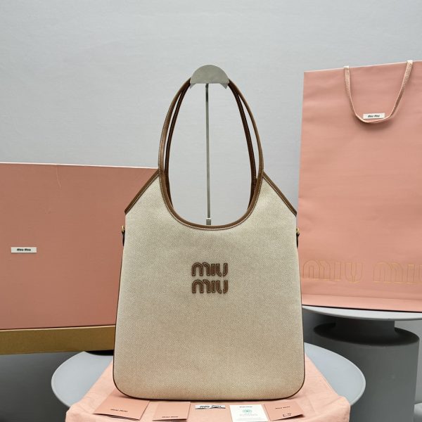 MIUMIU Borsa Ivy in canvas e pelle